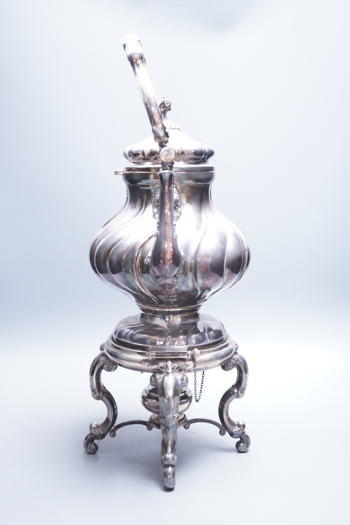 A late 19th century Italian 800 standard white metal tea kettle on stand with burner, of spiral pear form, makers mark AL 1, overall height 48.5cm